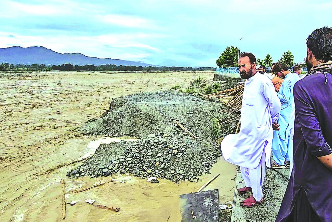 Flash floods in Pakistan kill eight after deluge sweeps away dozens ...